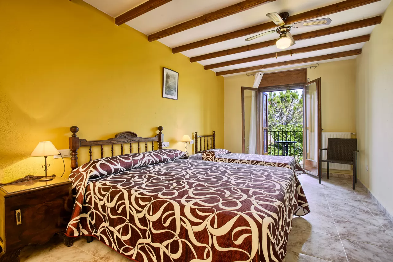 Dormitorio cuádruple