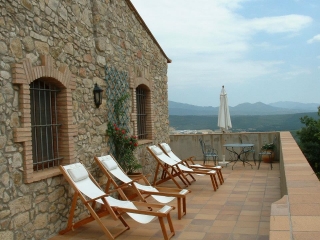 Deck chairs on the terrace with views