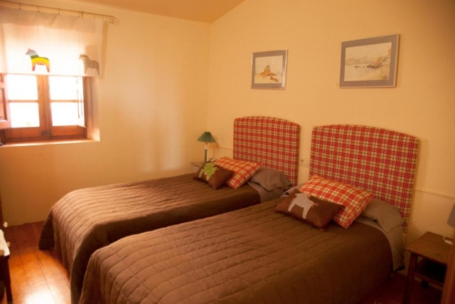 Dormitorio doble con camas