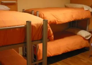 Cama individual en habitación compartida 2