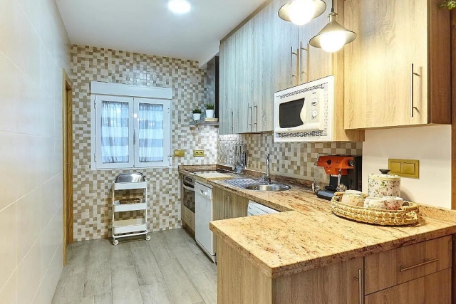 Cocina con encimera en L