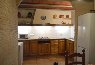 Cocina que comunica con la zona del comedor