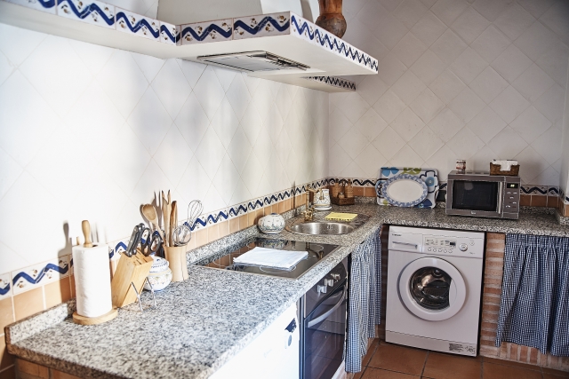 Cocina con encimera en L