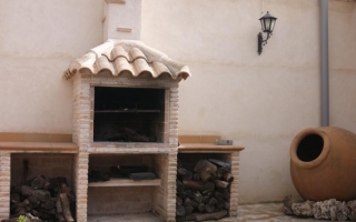 Zona de barbacoa en el patio