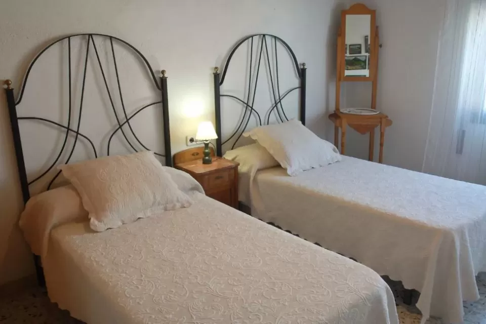Dormitorio con baño propio
