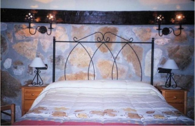 Habitacion de matrimonio con colcha