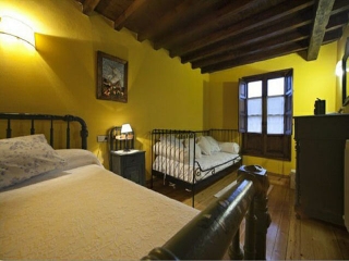 Habitación de matrimonio con diván