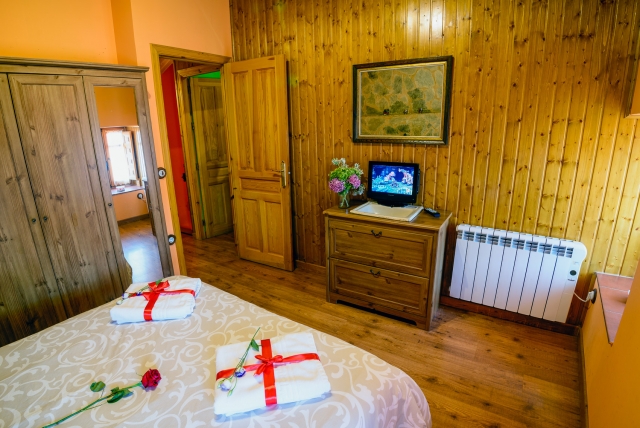 Dormitorio en madera