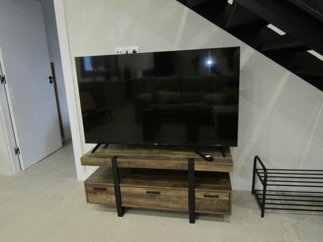 Sala de estar con tele 