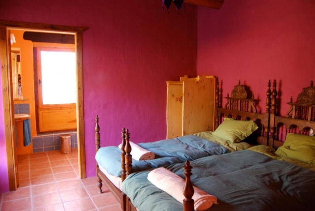 Dormitorio doble con aseo