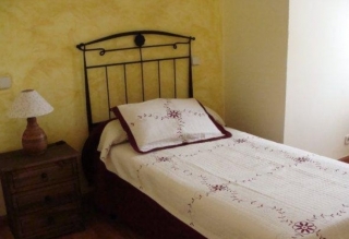 Cuarto con cama individual