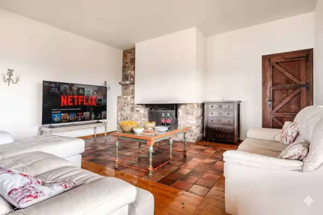 Sala con chimenea