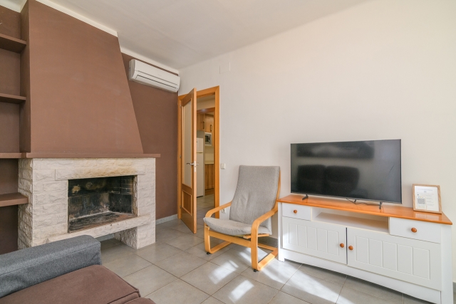 Santa Fe- Salon y chimenea