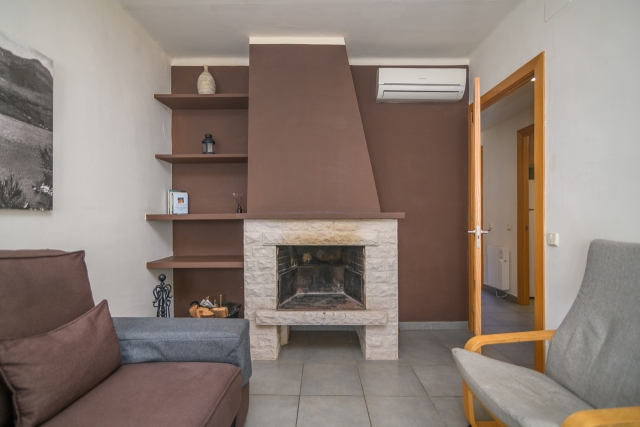 Santa Fe- Salon y chimenea