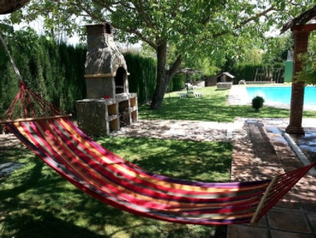 Barbacoa y Tumbona en la Terraza