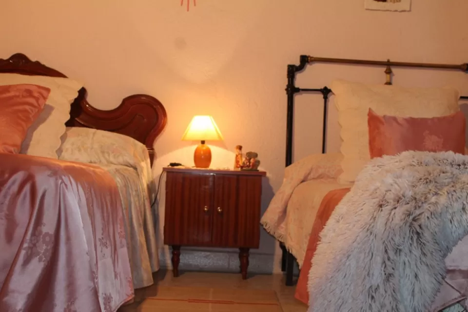 Dormitorio triple baño compartido