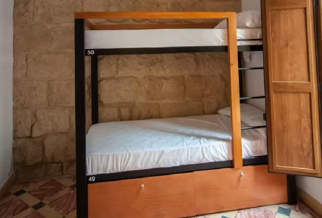2 Cama en habitación 8 personas