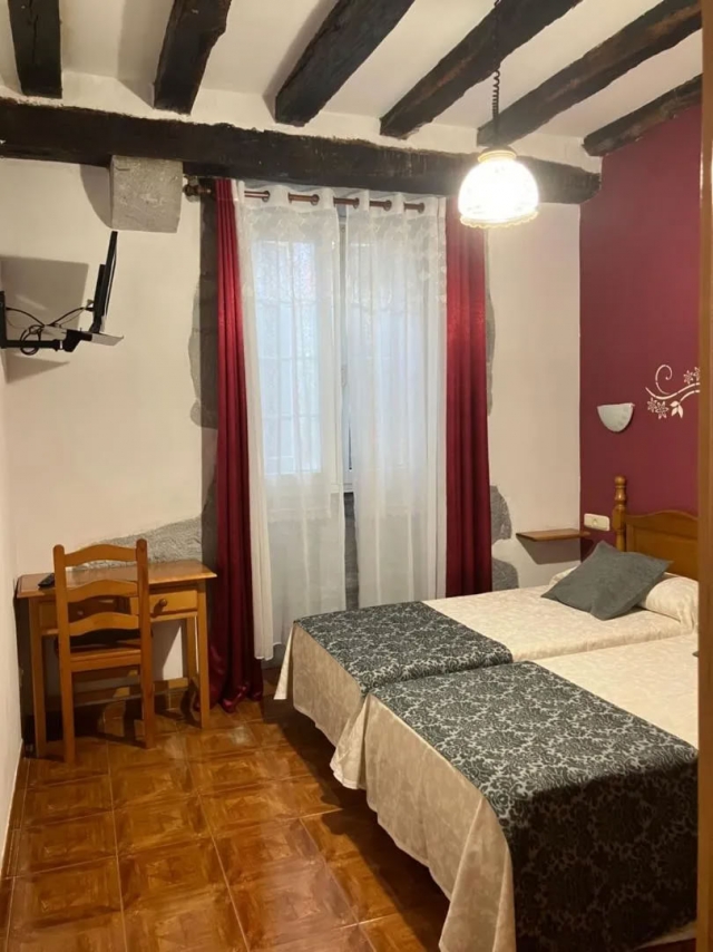 Dormitorio doble y tele 