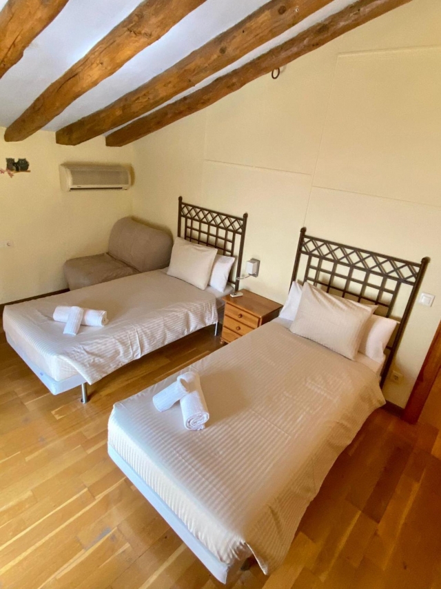 Dormitorio doble con camas