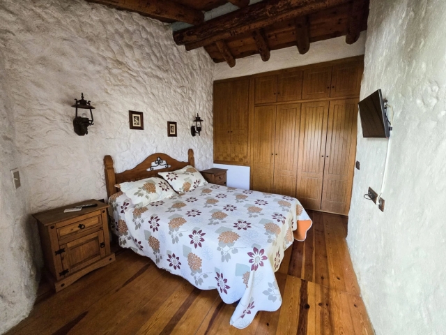 Dormitorio con tele