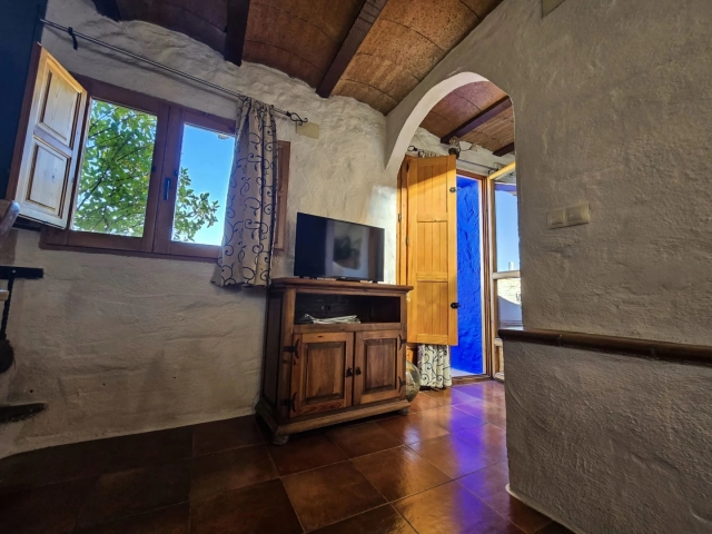 Sala de estar con tele 