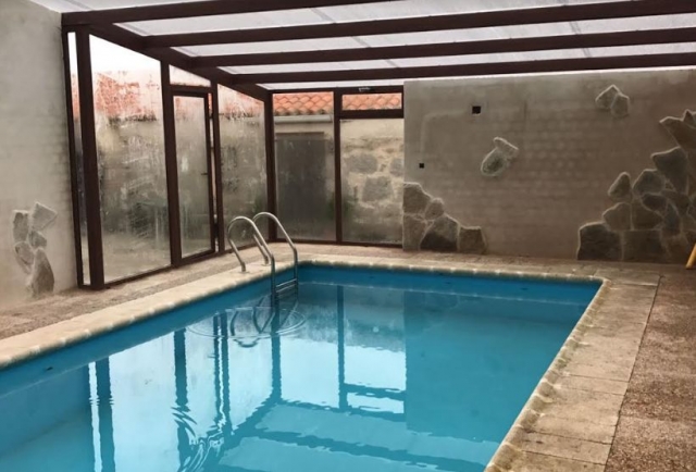  Covered pool of the spacious house 