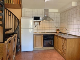 Cocina con encimera en L