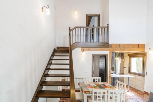 Sala de estar con escaleras