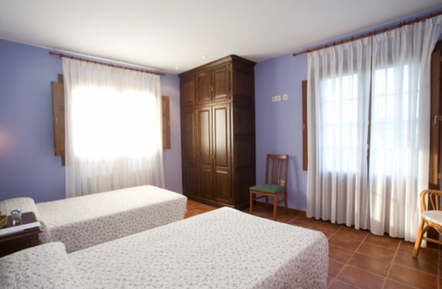 Dormitorio doble superior con dos camas