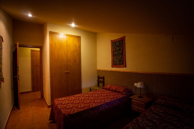 Dormitorio con camas