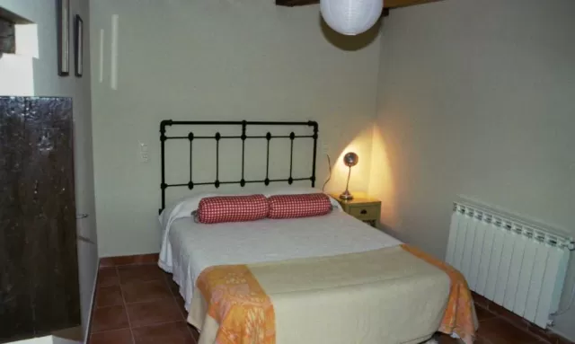 Dormitorio con calefaccion