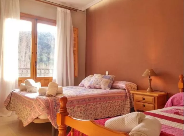 Dormitorio cuádruple