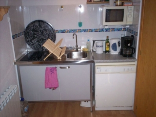 Cocina con elementos funcionales