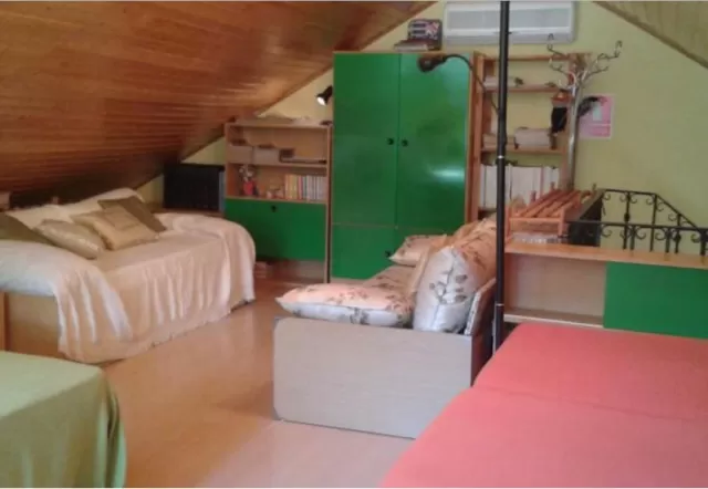 Dormitorio familiar en la buhardilla