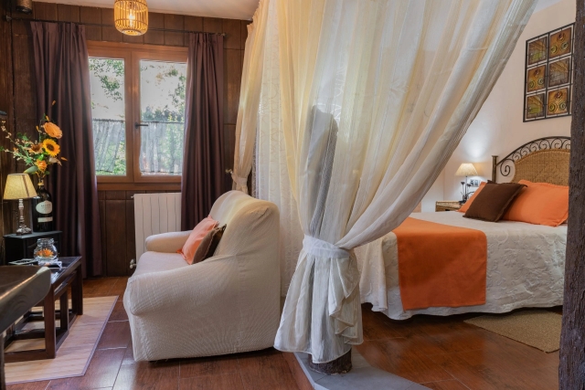 Dormitorio y sala de estar