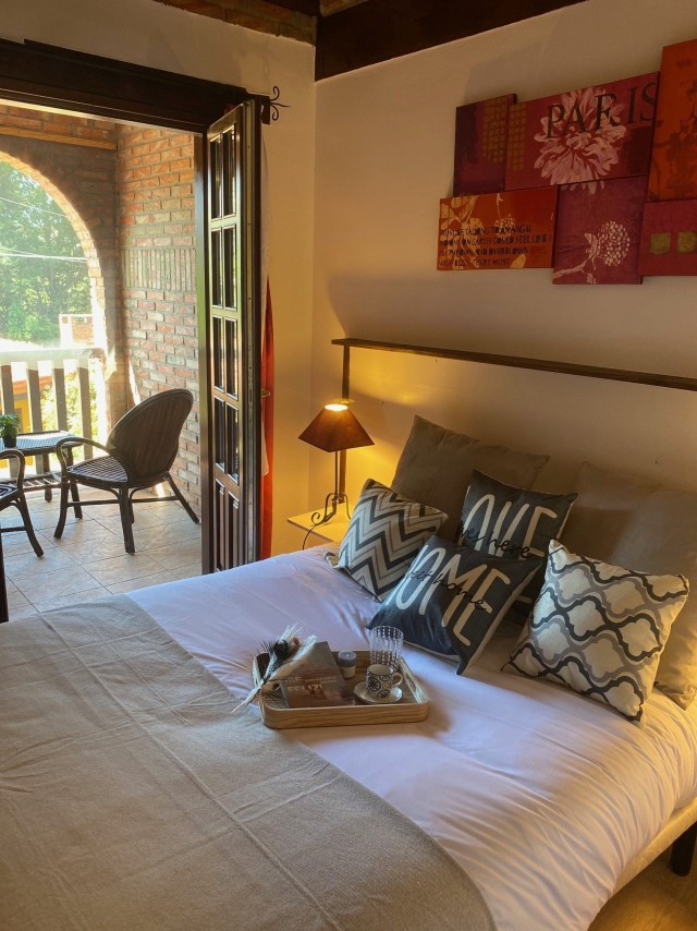 Dormitorio con terraza