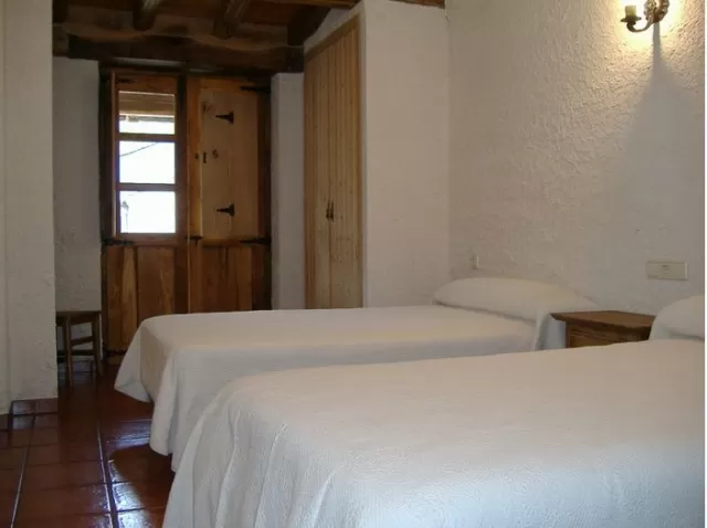 Dormitorio cuádruple