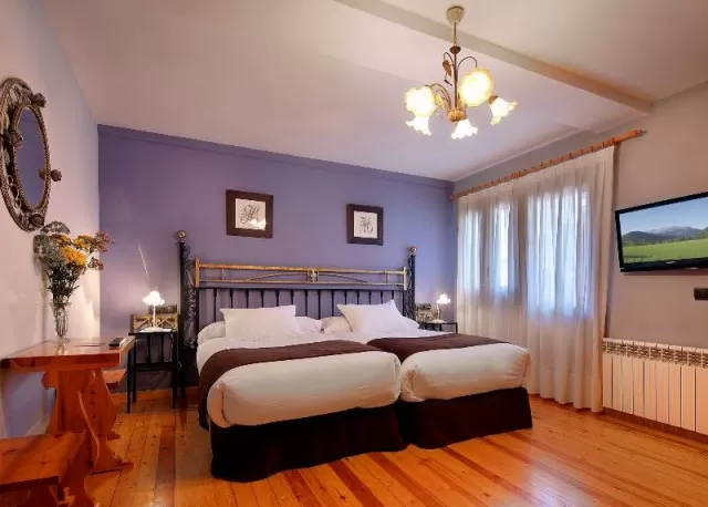 Dormitorio Triple Montaña