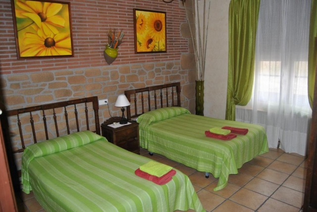 Dormitorio doble con colchas