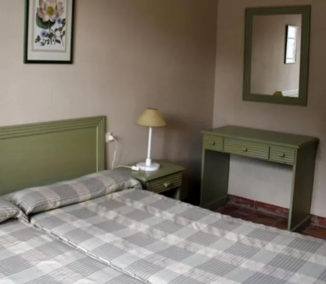Dormitorio doble 11