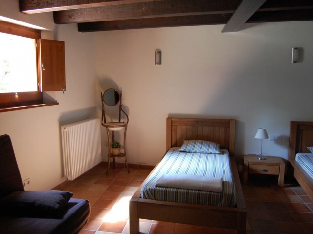 Dormitorio doble con colchas