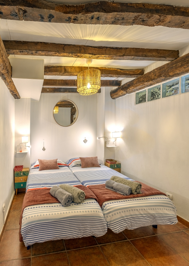 Dormitorio doble y camas