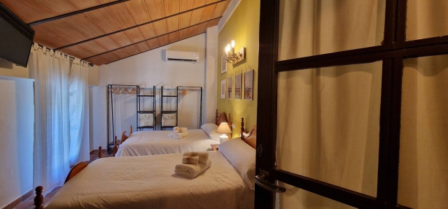 Dormitorio doble con camas individuales