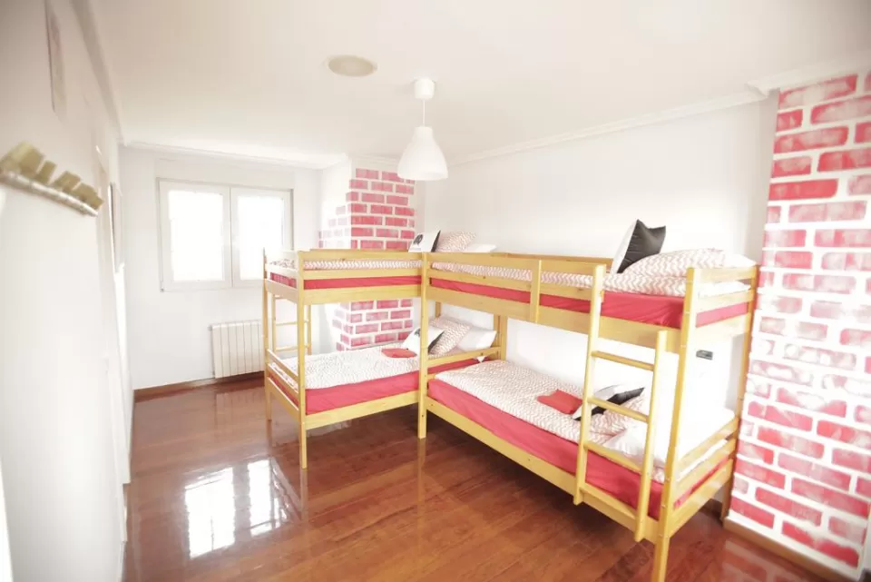 Cama en habitación 6 plazas