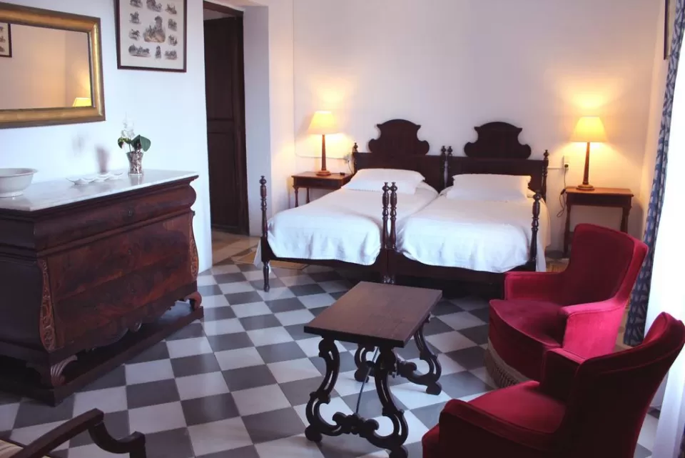 Dormitorio doble con salón