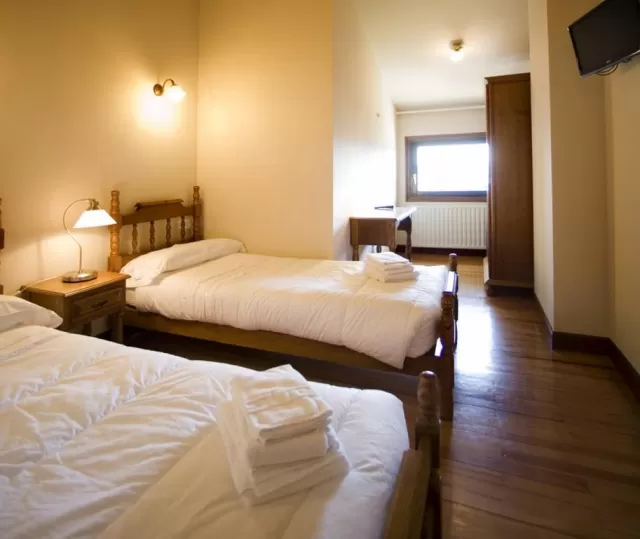 Chambre double avec lits simples