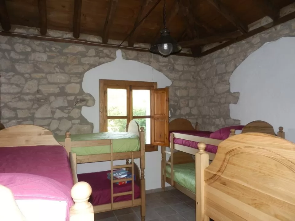 Cama en habitación 8 plazas 1
