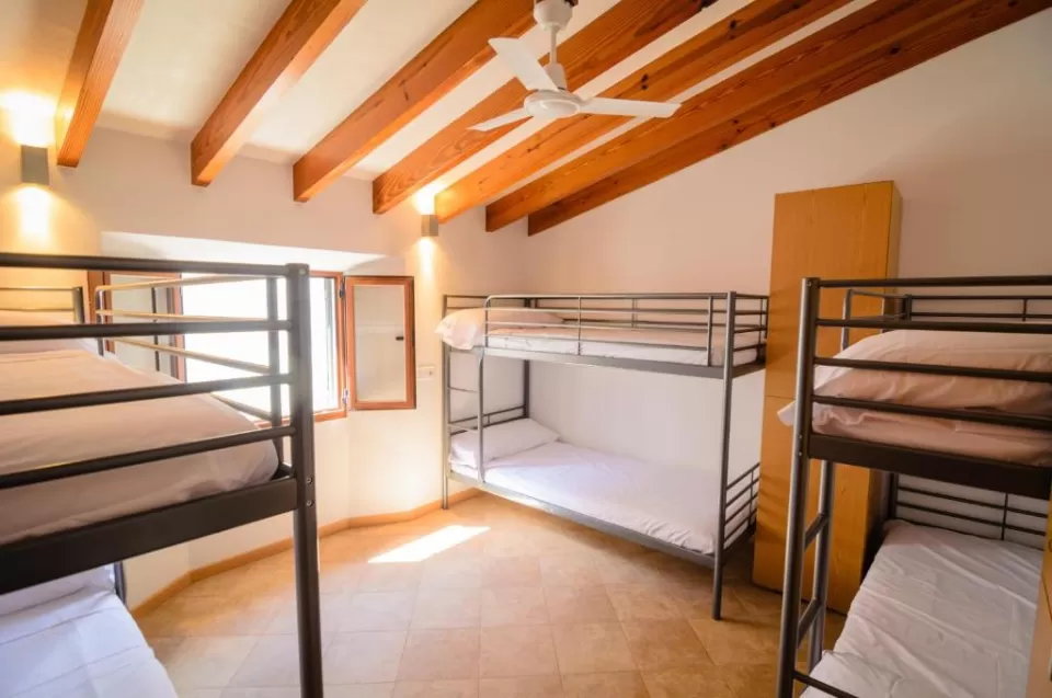 Cama en habitación mixta 8 pax