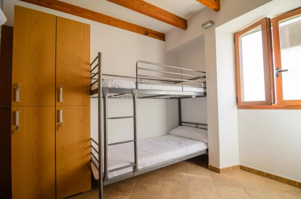 Cama en habitación mixta 6 pax