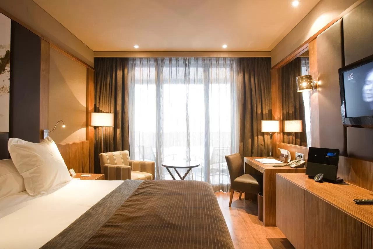 Habitación Doble con cama supletoria (2 adultos + 1 niño)